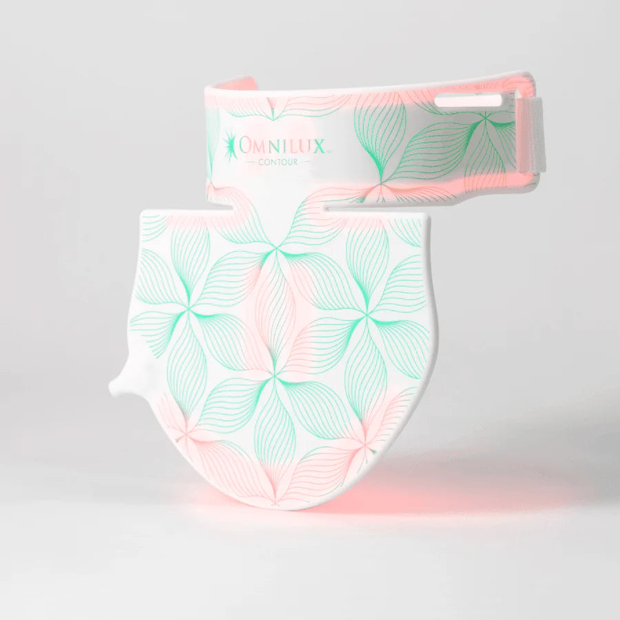 Floral-patterned LED mask with pink border on a gray background