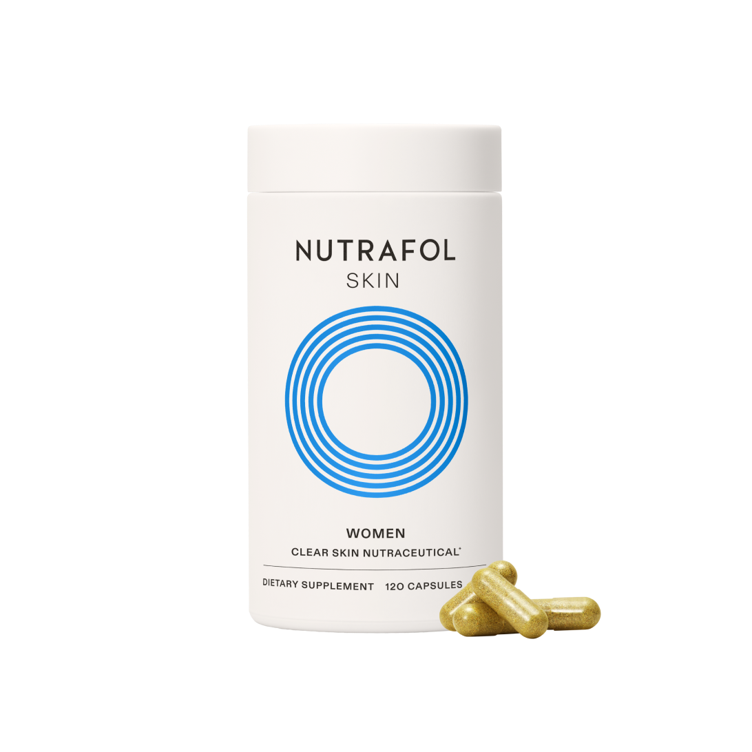 Nutrafol skin supplement container with capsules on a white background