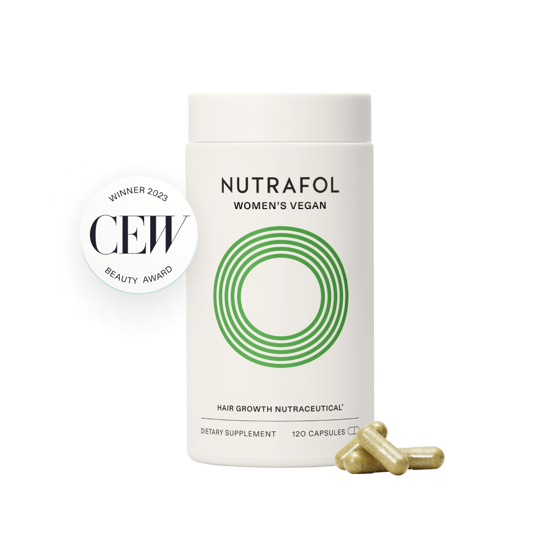 Nutrafol women's vegan hair growth supplement with capsules on a white background